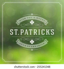 Typographic Saint Patrick's Day Retro Background. Vintage Vector design greetings card or poster. Bokeh blurred green lights backdrop.