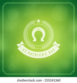 Typographic Saint Patrick's Day Retro Background. Vintage Vector design greetings card or poster. Bokeh blurred green lights backdrop.