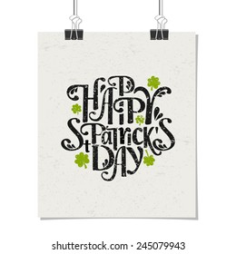 Afiche estilo tipográfico para el Día de San Patricio con el mensaje Feliz Día de San Patricio. Diseño de afiches maquillaje con clips de papel, aislados en blanco.