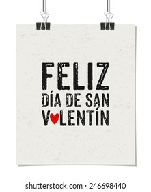 Typographic style poster for Valentine's Day. Poster design mock-up with paper clips, isolated on white. Feliz Dia de San ValentiÂ­n - Happy Valentine's day in Spanish.