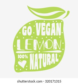 Typography. Motivational print. Lemon. Quote/ Go vegan. 100% natural. Can be used as a print on T-shirts, bags, label organic food. Inspirational eco poster. Typography design 