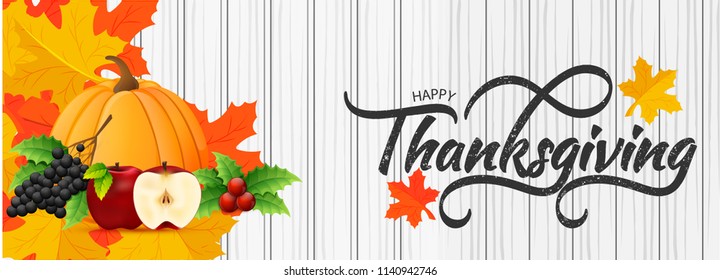 Typography text Happy Thanksgiving on gray wooden textured background with fruit elements on shiny maple leaves. Header or banner design.