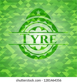 Tyre green emblem with mosaic background