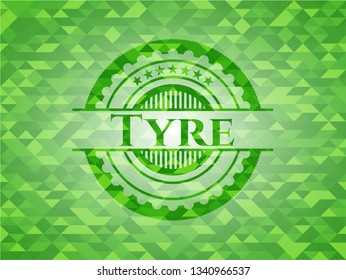Tyre green emblem with triangle mosaic background