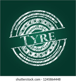 Tyre on blackboard