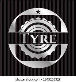 Tyre silvery shiny badge