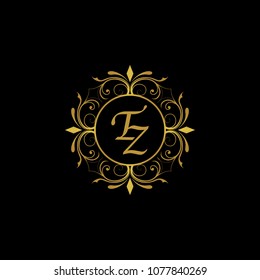 TZ Initial logo. Ornament ampersand monogram golden logo black background
