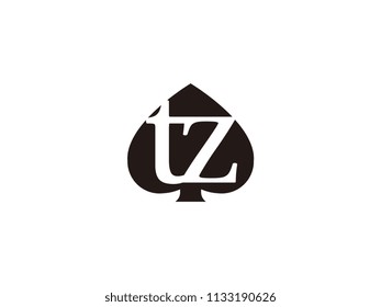 The tz initials logo inside the black shovel
