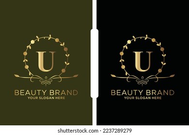 U Beauty vector initial logo, Golden floral letters with flowers leaves and gold splatters isolated on white background. Vector illustration for wedding, greeting cards, invitations template design