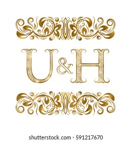 U and H vintage initials logo symbol. The letters are surrounded by ornamental elements. Wedding or business partners monogram in royal style.