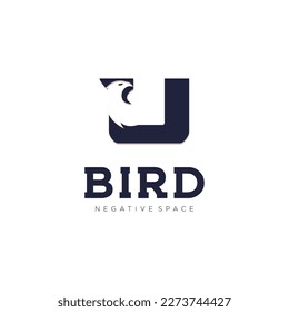 U Initial letter bird logo in simple minimalist negative space