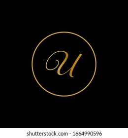 U letter logo with black background.Gold letter logo.This is gold script letter design.