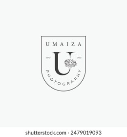 Logotipo de la letra U con un concepto floral creativo para el Vector premium de los bienes raíces de la belleza del negocio de la compañía