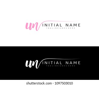U N Initial handwriting logo vector. Hand lettering for designs.
