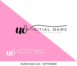 U O Initial handwriting logo vector. Hand lettering for designs.