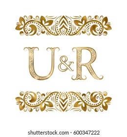 U and R vintage initials logo symbol. The letters are surrounded by ornamental elements. Wedding or business partners monogram in royal style.