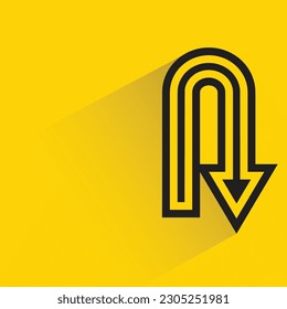 u turn arrow with shadow on yellow background