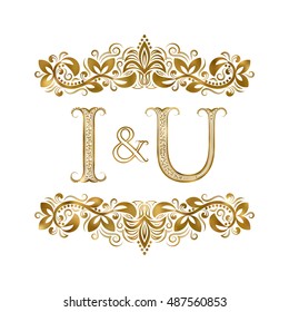 I and U vintage initials logo symbol. The letters are surrounded by ornamental elements. Wedding or business partners monogram in royal style.