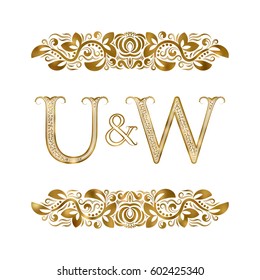 U and W vintage initials logo symbol. The letters are surrounded by ornamental elements. Wedding or business partners monogram in royal style.