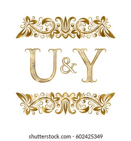 U and Y vintage initials logo symbol. The letters are surrounded by ornamental elements. Wedding or business partners monogram in royal style.