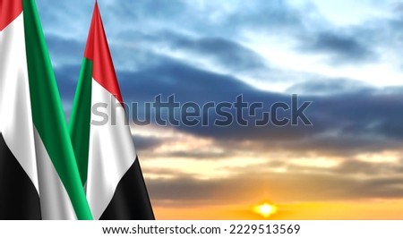 UAE flags on background of sunset or sunrise. Concept for National Holidays. EPS10 vector