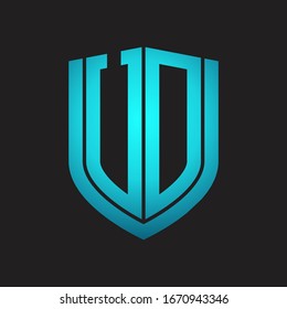 UD Logo monogram with emblem shield design isolated with blue colors on black background