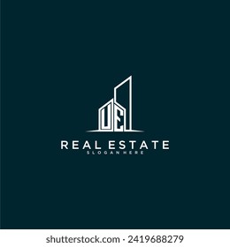 UE initial monogram logo real estate with building style design vector