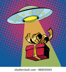 UFO abducts gift box, pop art retro vector illustration