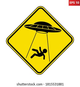 UFO abducts human from earth. Vector illustration of yellow diamond shaped warning road sign with alien abducts man. Caution alien invasion in unidentified spaceship. Humorous traffic sign.