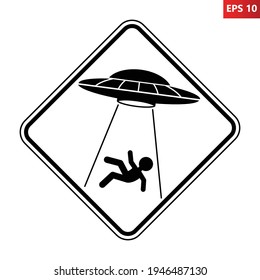 UFO abducts human from earth. Vector illustration of black and white diamond shaped warning road sign with alien abducts man. Caution alien invasion in unidentified spaceship. Humorous traffic sign.