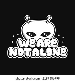 Ufo alien print for t-shirt art. We are not alone quote. Vector line doodle cartoon graphic illustration logo design.Ufo,alien,text phrase print for poster, t-shirt concept