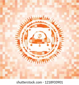 ufo with aline inside icon inside abstract orange mosaic emblem with background