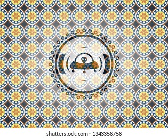 ufo with aline inside icon inside arabesque style badge. arabic decoration.