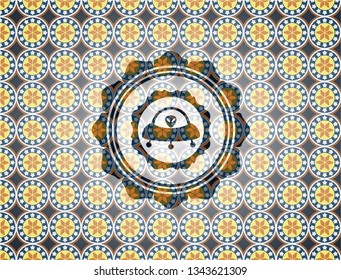 ufo with aline inside icon inside arabesque emblem background. arabic decoration.