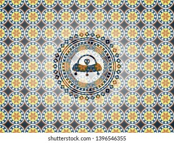 ufo with aline inside icon inside arabesque emblem background. arabic decoration.