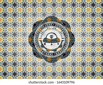 ufo with aline inside icon inside arabesque style badge. arabic decoration.