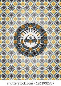 ufo with aline inside icon inside arabic style badge. Arabesque decoration.