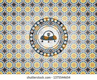 ufo with aline inside icon inside arabic badge. Arabesque decoration.