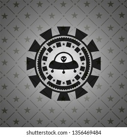 ufo with aline inside icon inside black emblem. Vintage.
