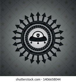 ufo with aline inside icon inside black badge
