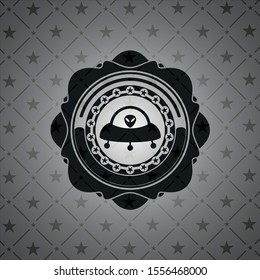 ufo with aline inside icon inside black emblem. Vintage.