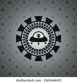 ufo with aline inside icon inside black emblem