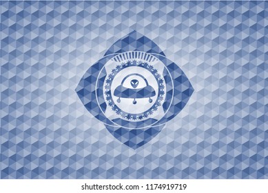 ufo with aline inside icon inside blue badge with geometric background.