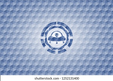 ufo with aline inside icon inside blue emblem with geometric pattern.