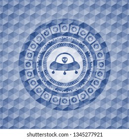 ufo with aline inside icon inside blue emblem or badge with abstract geometric polygonal pattern background.