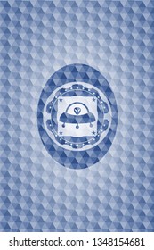 ufo with aline inside icon inside blue badge with geometric background.