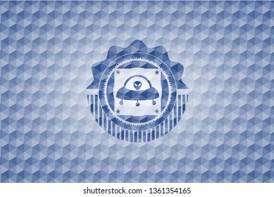 ufo with aline inside icon inside blue badge with geometric pattern background.