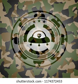 ufo with aline inside icon inside camouflage texture