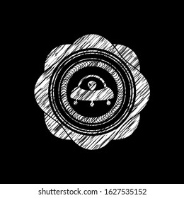 ufo with aline inside icon with chalkboard texture