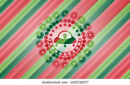 ufo with aline inside icon inside christmas emblem.